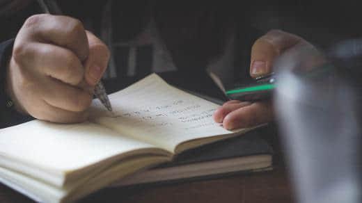 Writing in a notebook Writing in a notebook