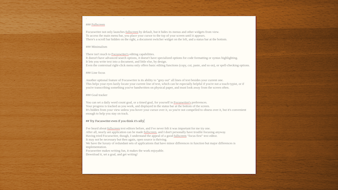 Focuswriter white box with gray wording on wooden writing desk background theme 木质写字台背景主题上的 Focuswriter 白色盒子与灰色字样
